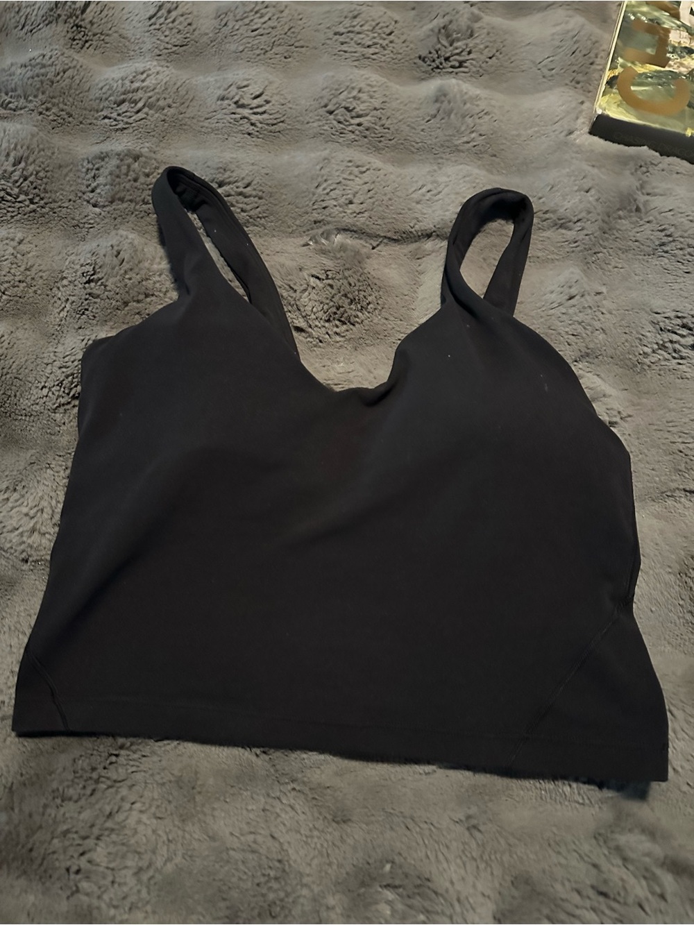 Black Lululemon sports bra with removable padding. Size 8